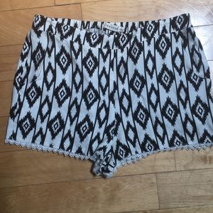Black and white patterned shorts.